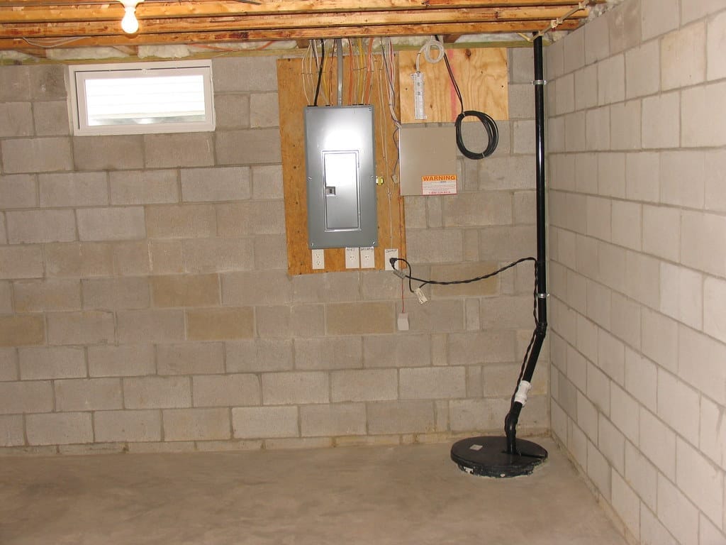Illustrative example of a crawl space perimeter drain and sump pump system